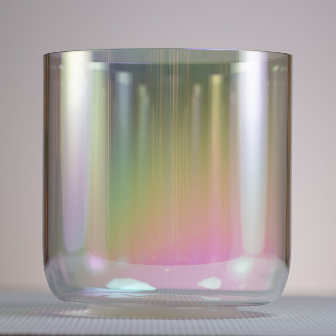 A 7.25 inch G#+4 prismatic rainbow crystal singing bowl with iridescent colors from Bowls of Sound
