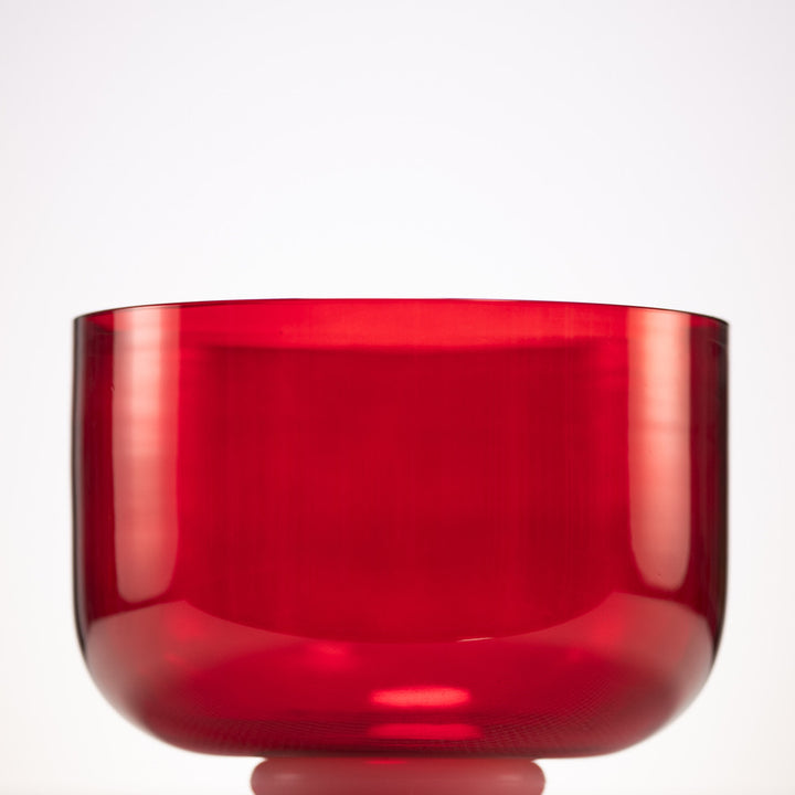 Red crystal bowl on a white background