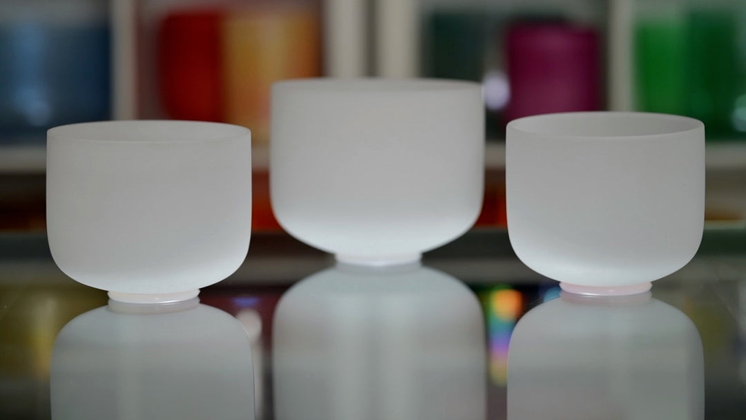 Three white frosted crystal singing bowls from Sacred Singing Bowls