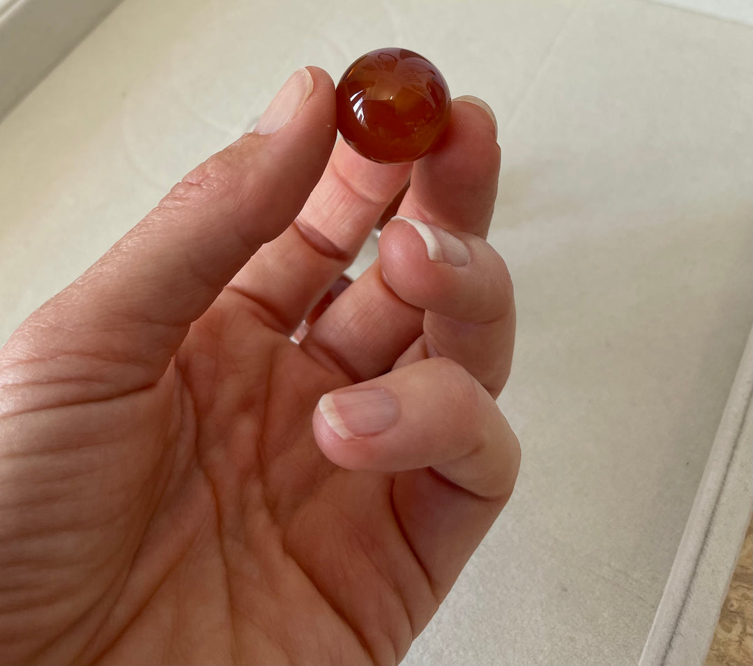 Tiny Carnelian Spheres