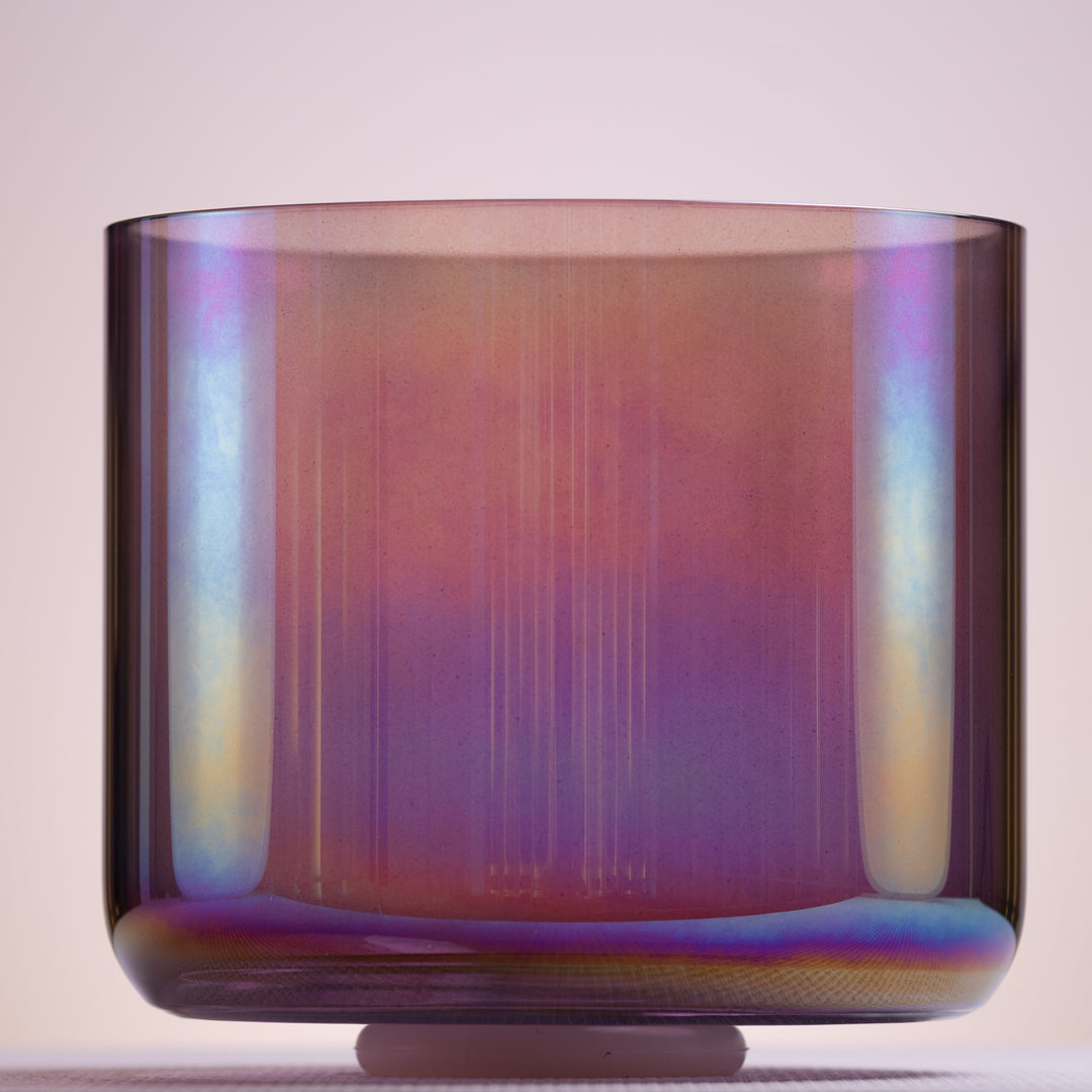 A 10.25-inch purple quartz crystal singing bowl with a prismatic finish, designed for sound therapy and chakra alignment.