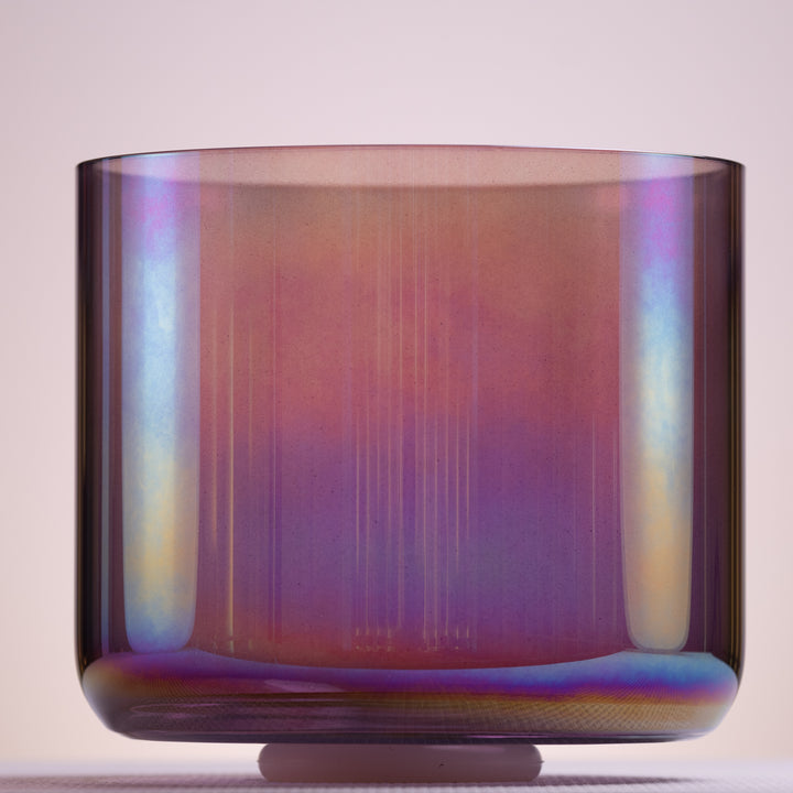 A 10.25-inch purple quartz crystal singing bowl with a prismatic finish, designed for sound therapy and chakra alignment.