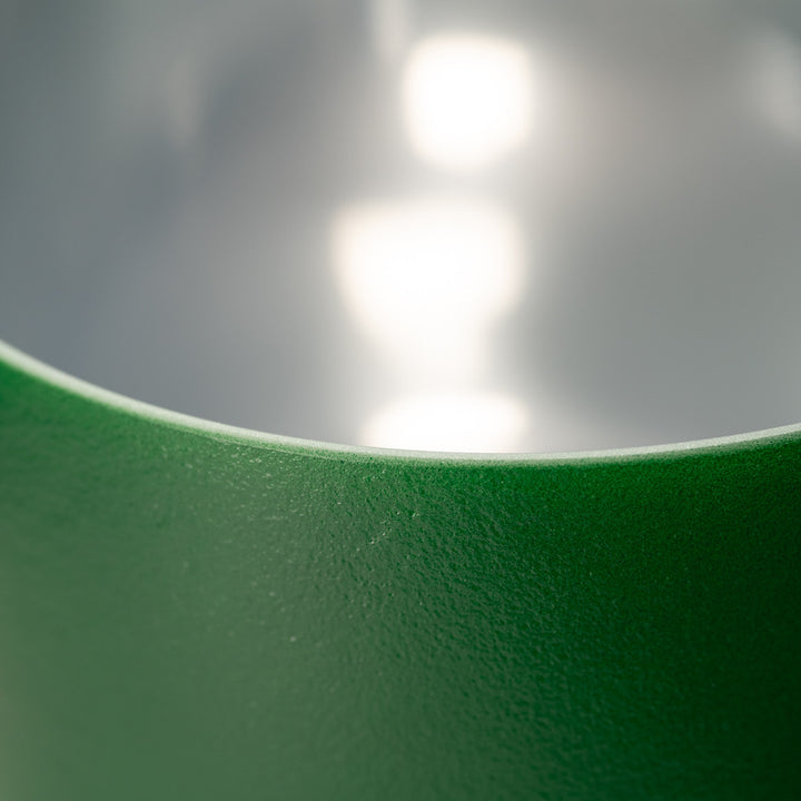 Green crystal singing bowl close up