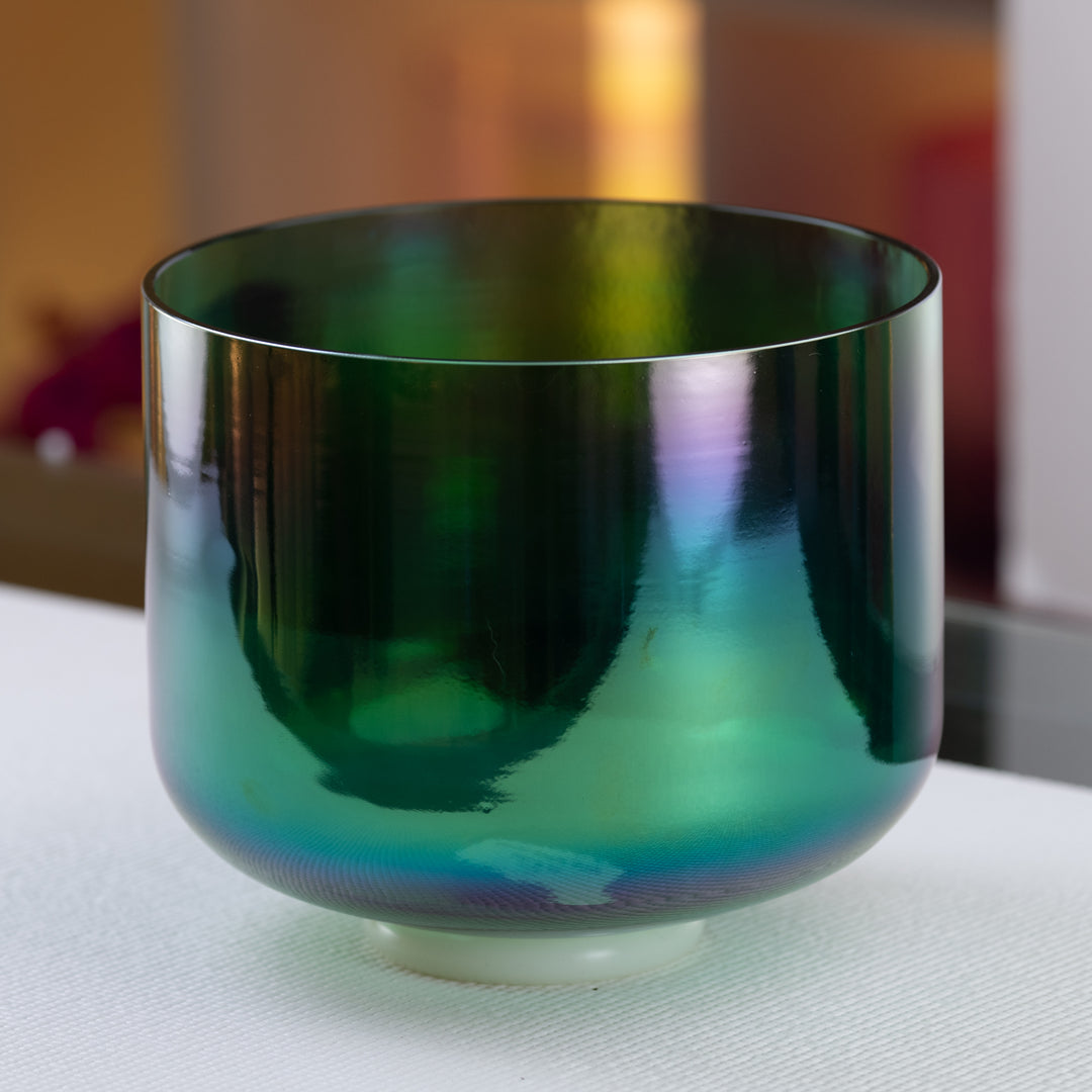 A 10 inch B-14 Earth Magic Crystal Singing Bowl with a prismatic color pattern, displayed on a white surface.