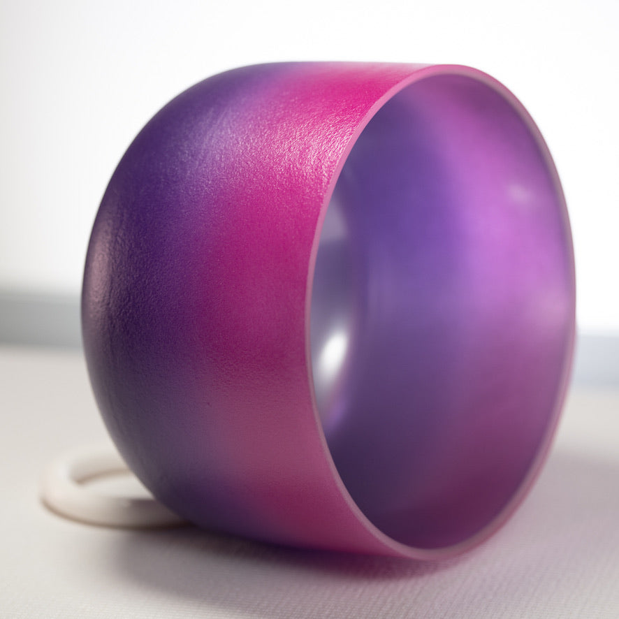 Pink and purple singing bowl for sound healing