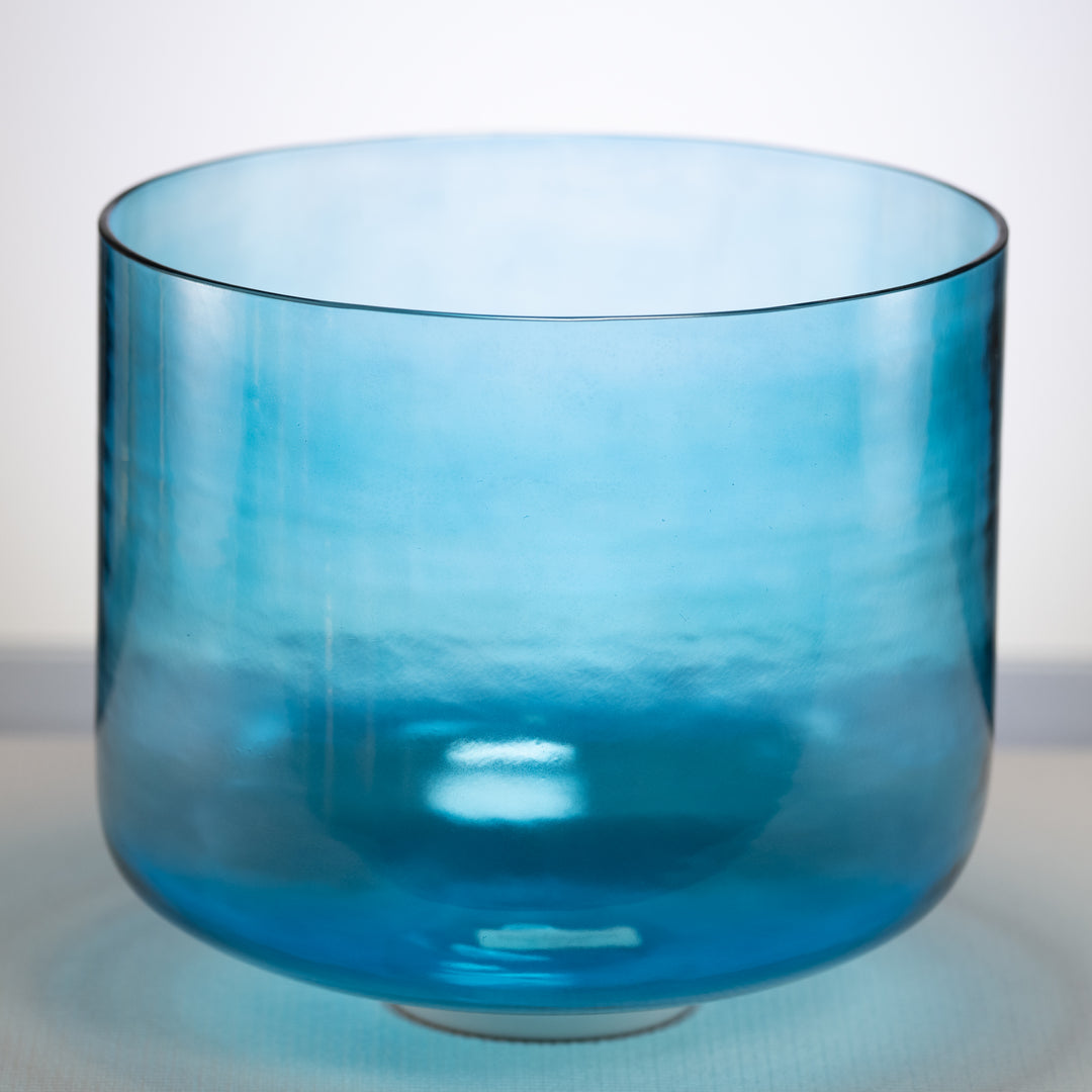 An image of a Caribbean Blue Crystal Singing Bowl with a gradient of lighter to darker blue.