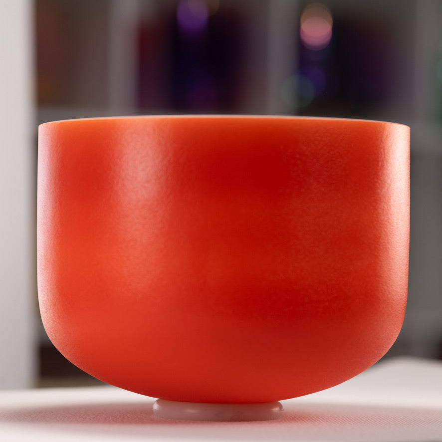Orange crystal singing bowl for sound healing