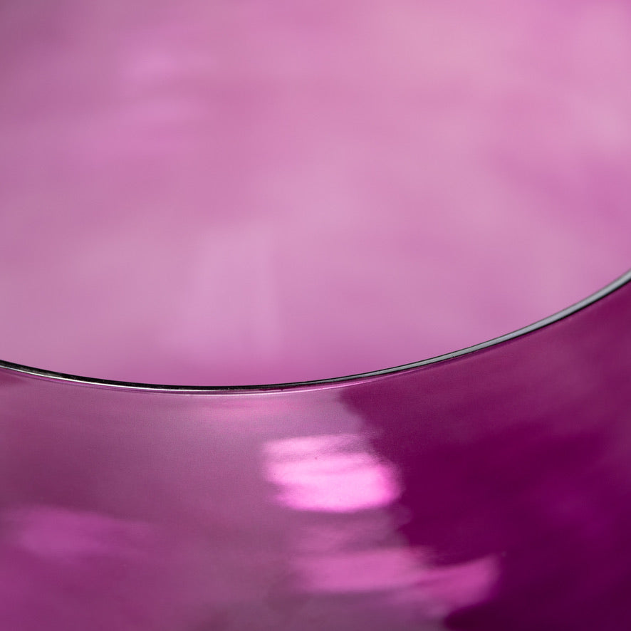 Purple singing bowl close up