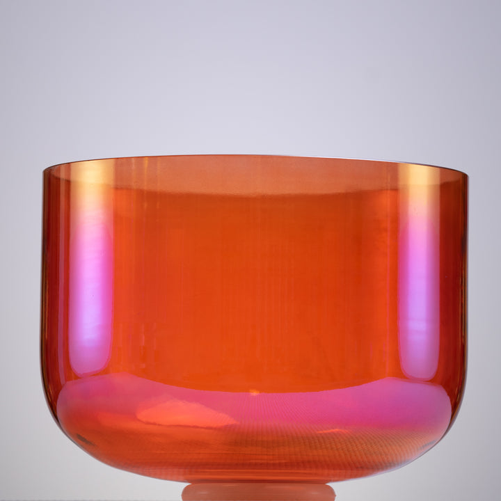 Orange crystal singing bowl for sound baths