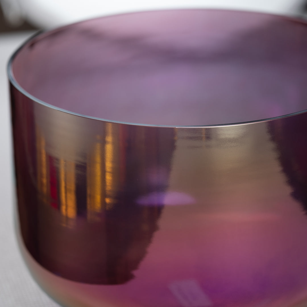 Close up of a purple crystal singing bowl