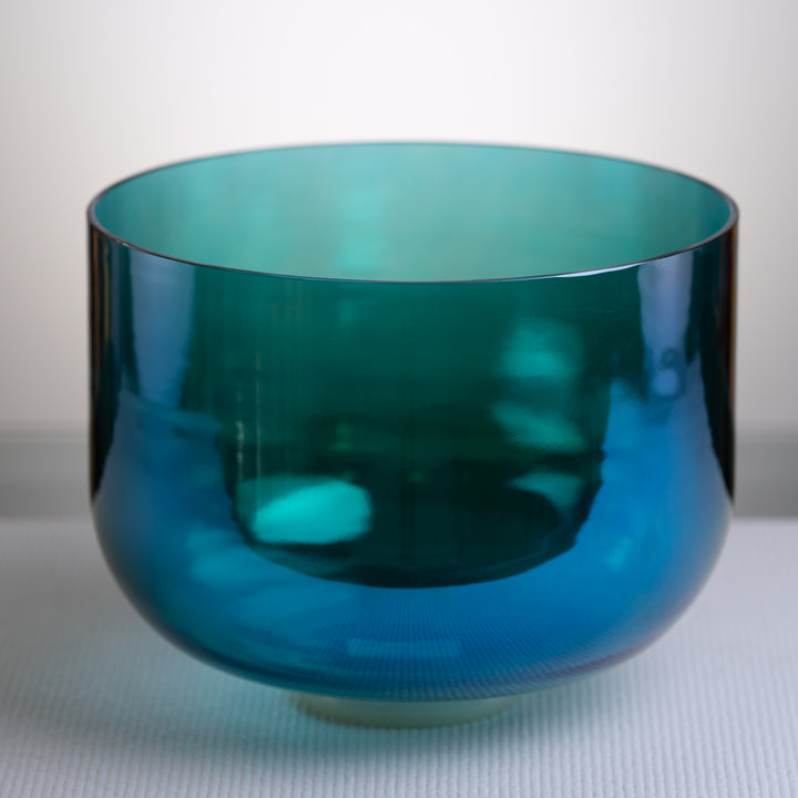 A 12 inch G-11 Whale Song Crystal Singing Bowl with a blue and green finish, displayed on a white background.