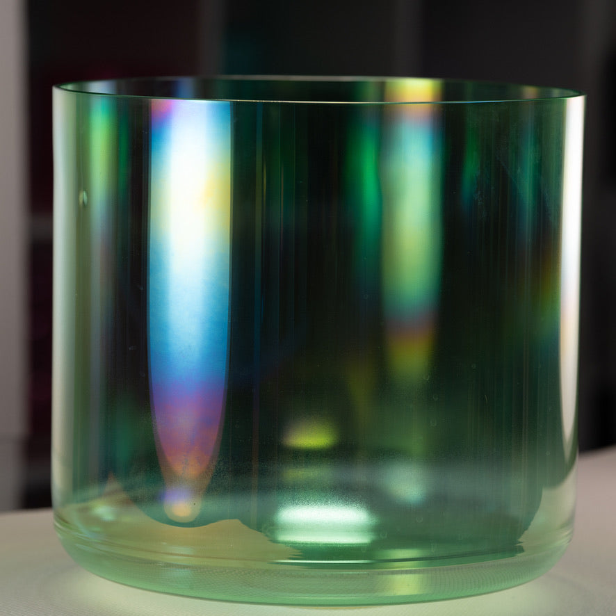 Large green crystal singing bowl for sound baths