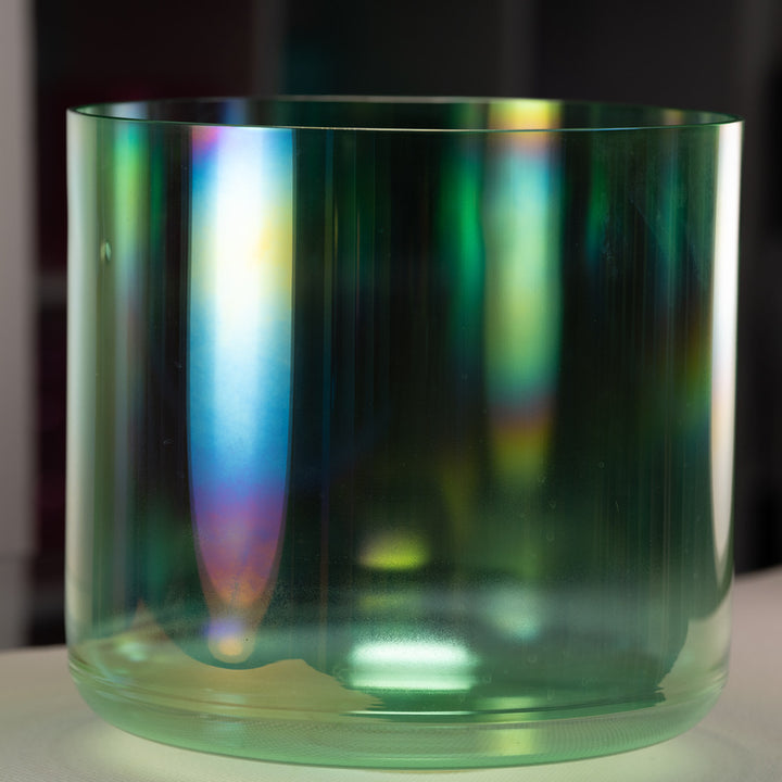 Large green crystal singing bowl for sound baths