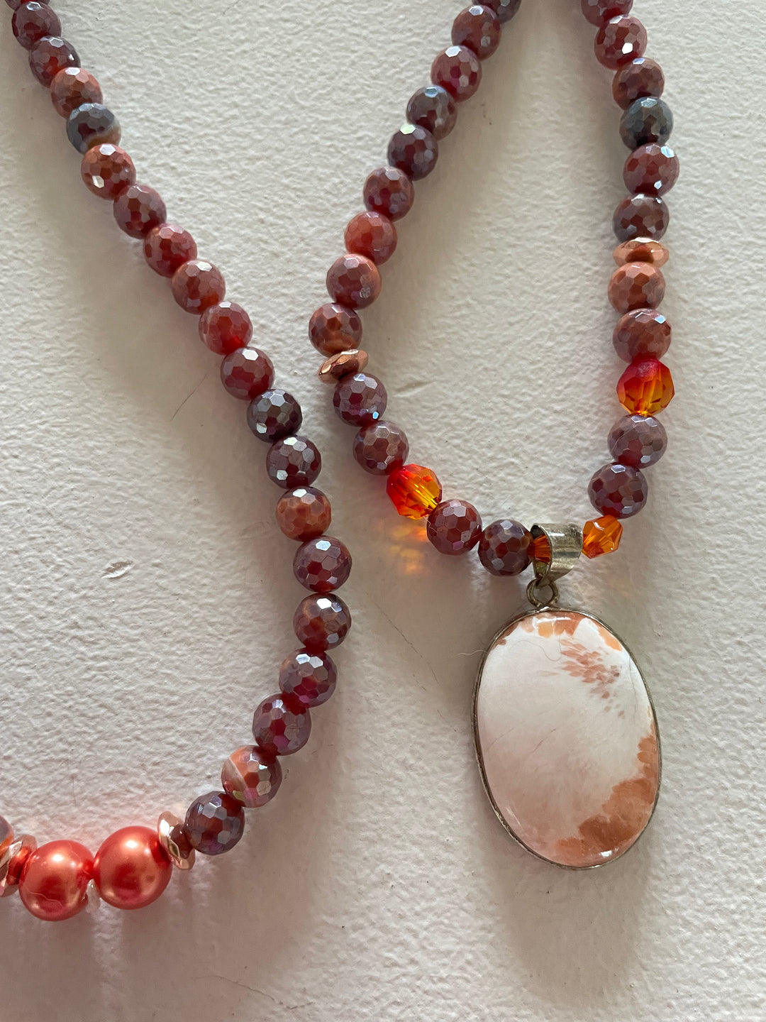 Faceted Fire Quartz Mala with White and Peach Scolecite pendant