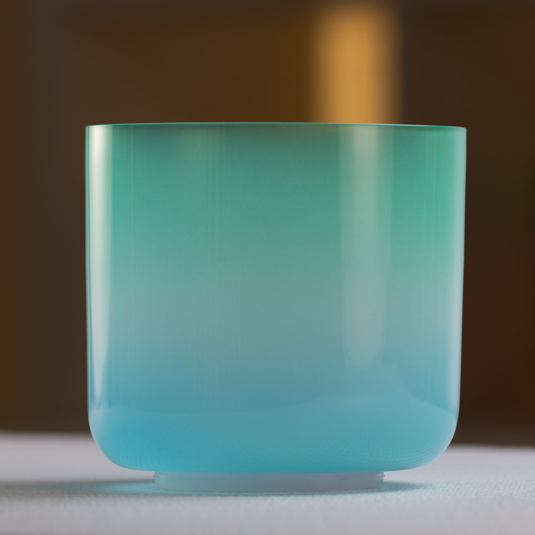 Green and blue throat chakra singing bowl