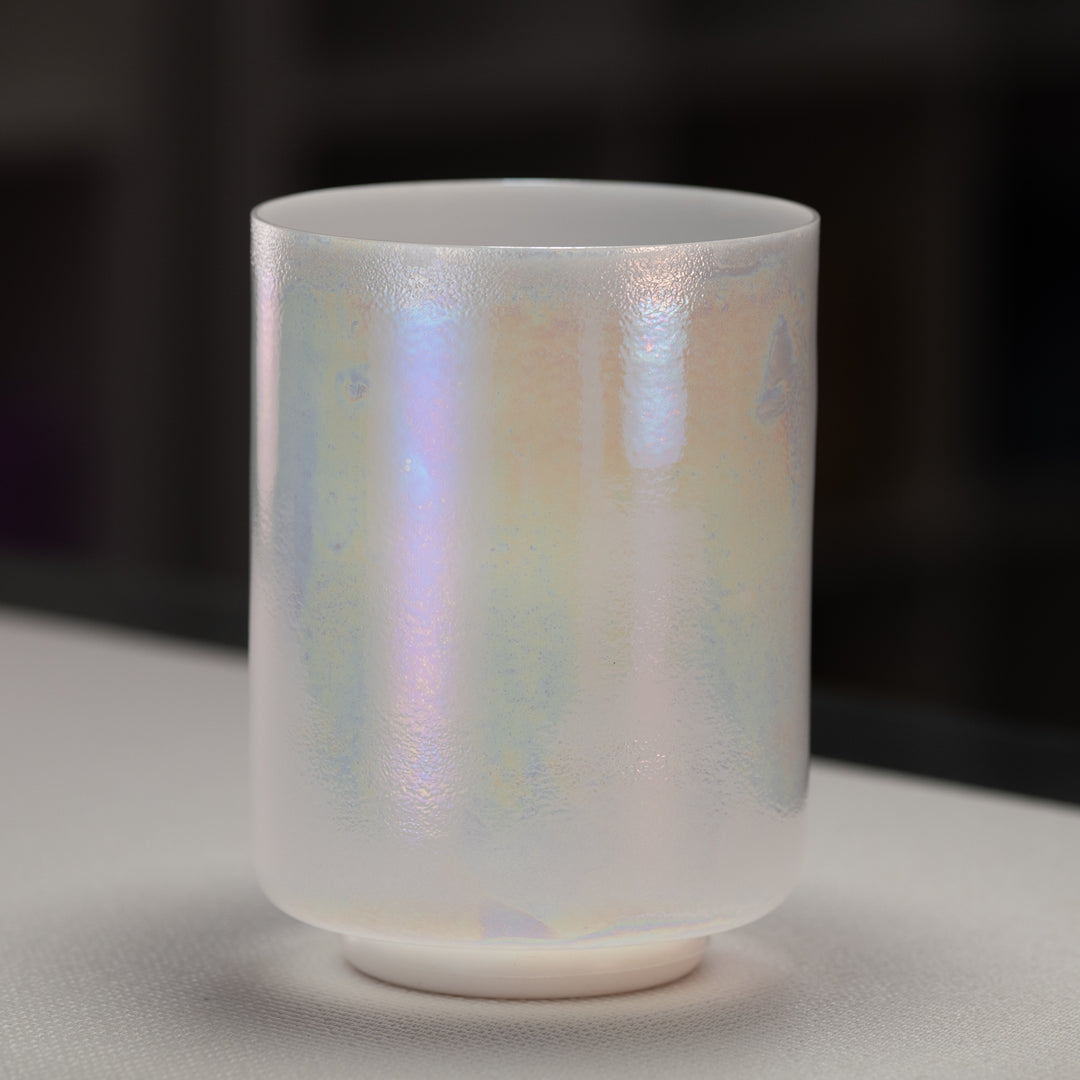 A 6.5 inch B-38 Majestic Moon Crystal Singing Bowl in white color with a metallic sheen, displayed against a neutral background.