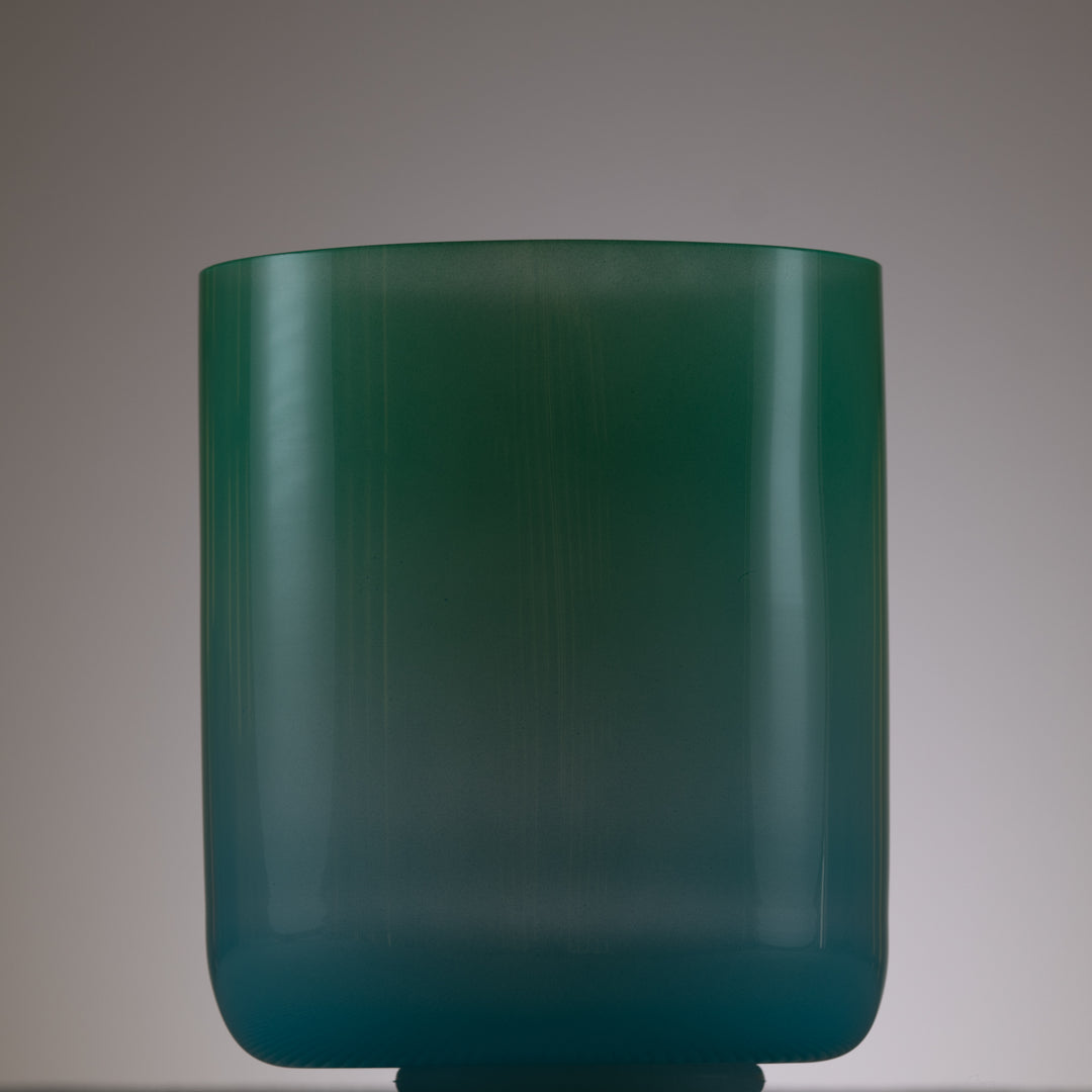 Blue and green crystal bowl for sound baths