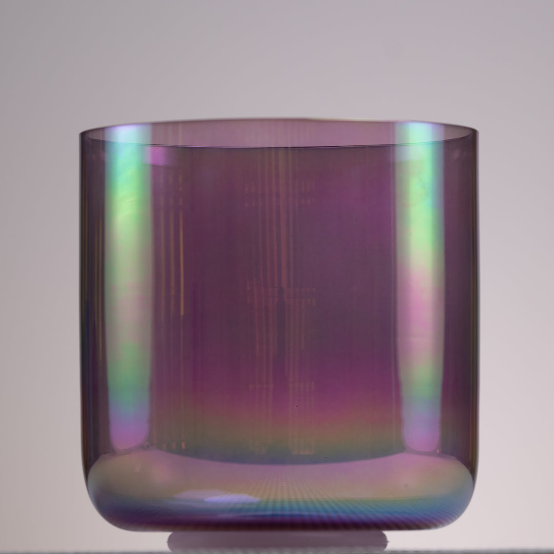 A 6.5" E-23 Amethyst Activation Crystal Singing Bowl with a prismatic, translucent purple hue.