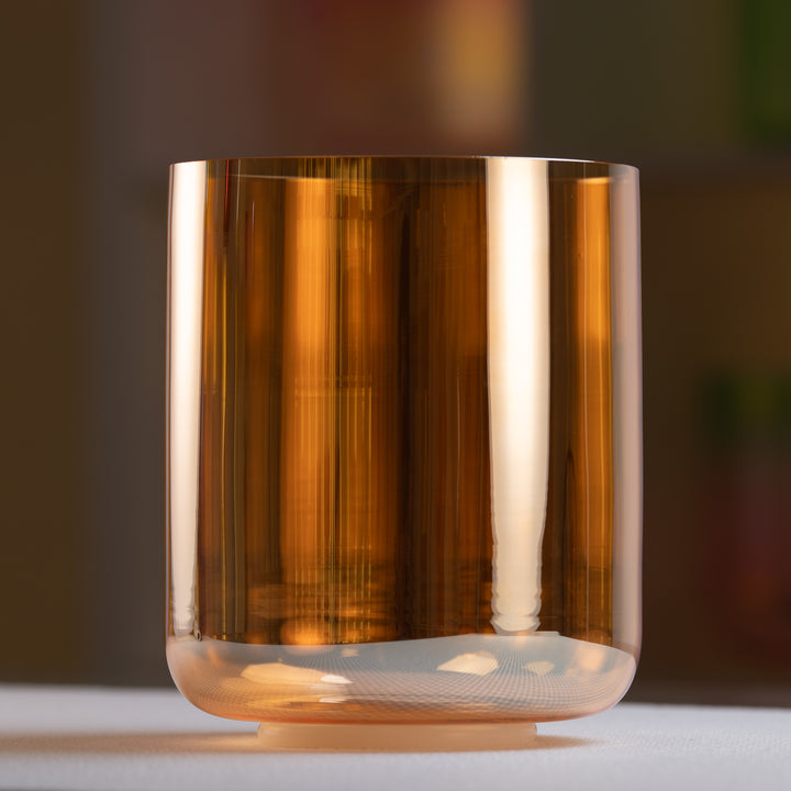 Orange crystal singing bowl for sound healing
