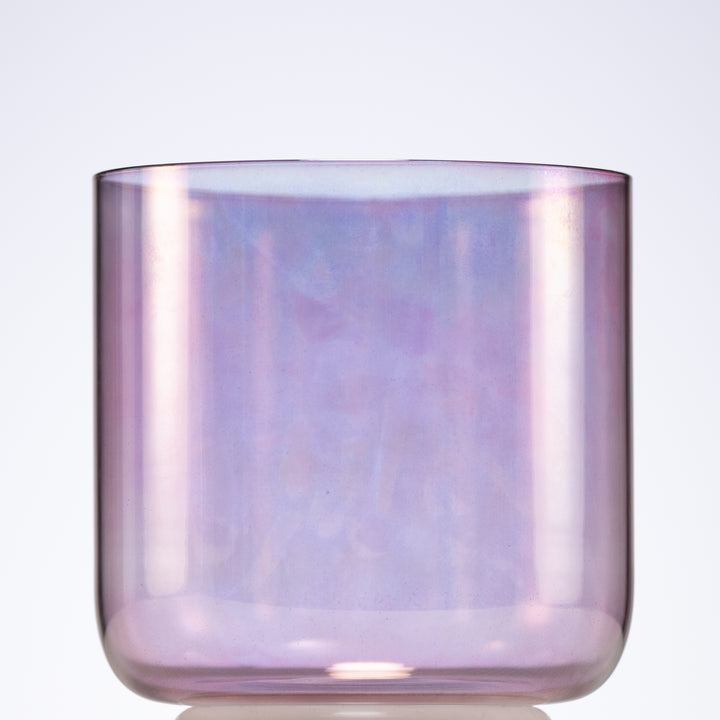 A 6-inch Solar Violet Crystal Singing Bowl with a reflective surface displaying shades of purple and pink.