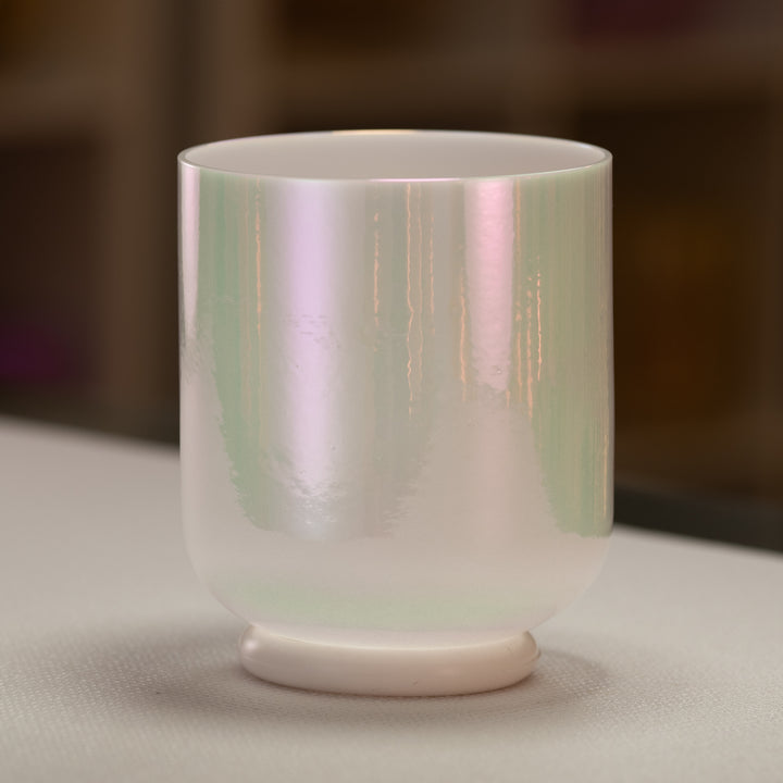 A 6-inch G-47 Majestic Moon Crystal Singing Bowl in white color, placed on a flat surface.