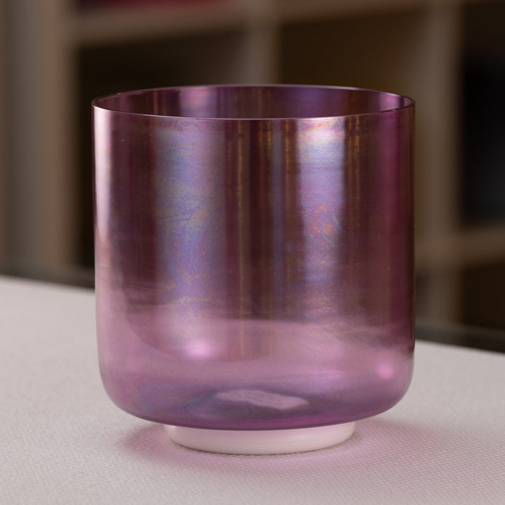 A#+37 Healing Violet Flame Crystal Singing Bowl, with a smooth, glossy surface reflecting light in a dark setting.