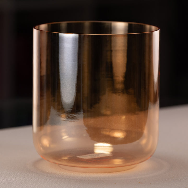 Orange singing bowl for meditation