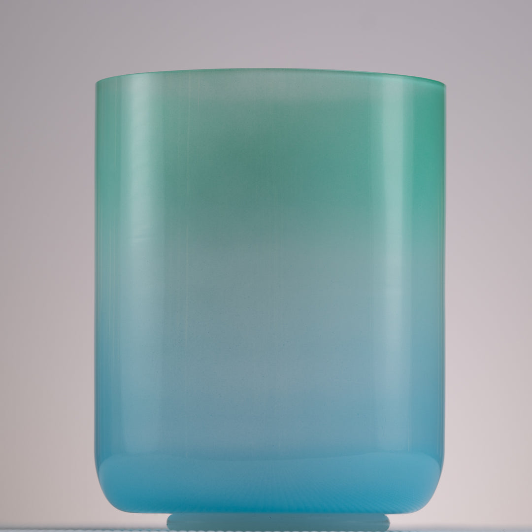 Blue and green crystal singing bowl for meditation