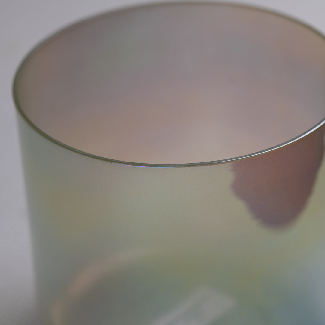 Green singing bowl close up