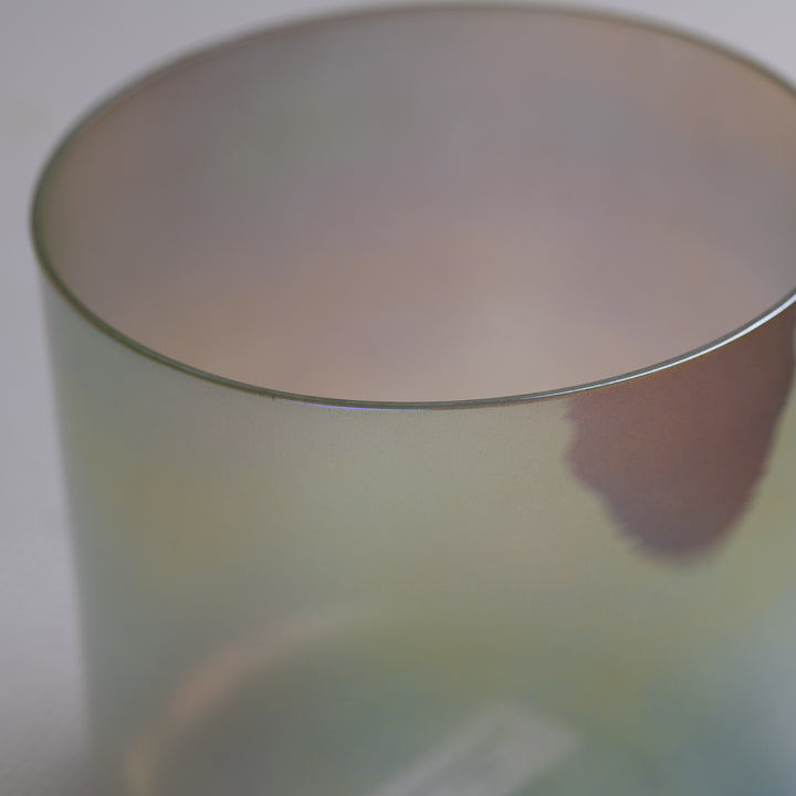 Green singing bowl close up