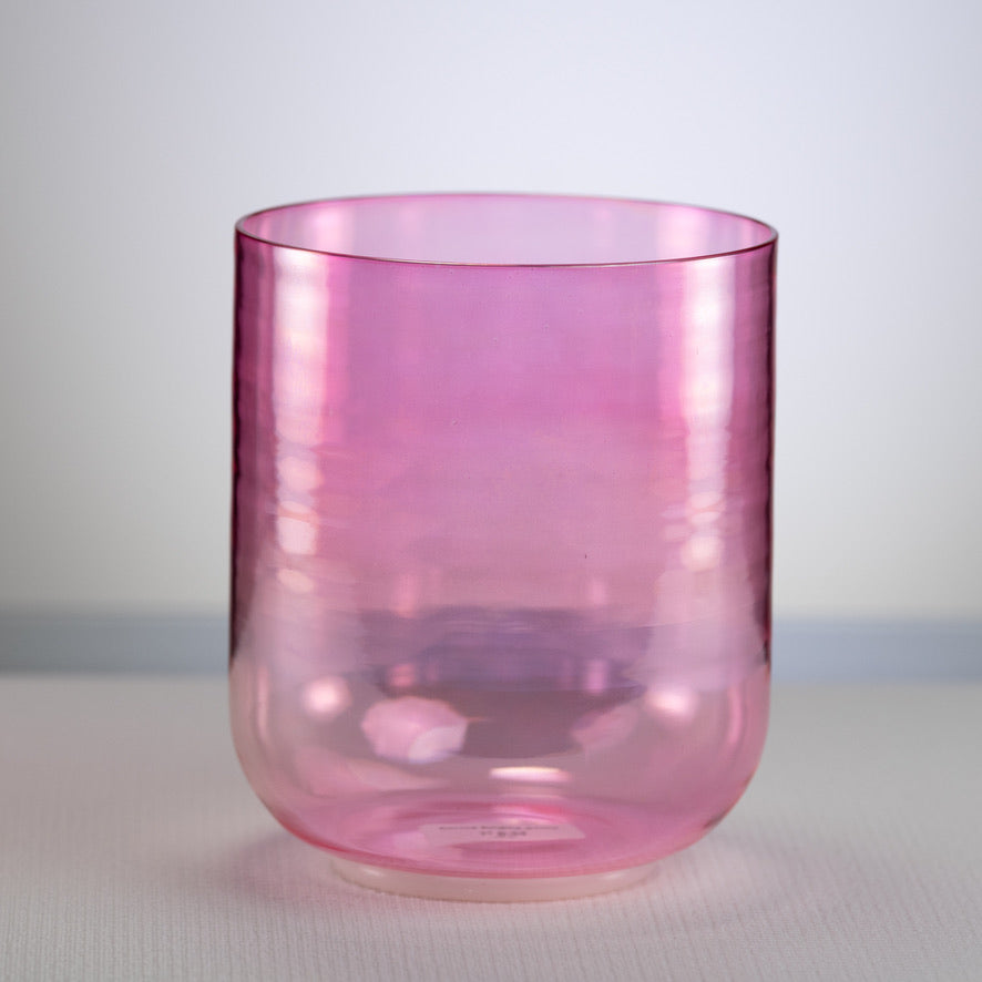 A 7 inch pink crystal singing bowl displayed against a neutral background.
