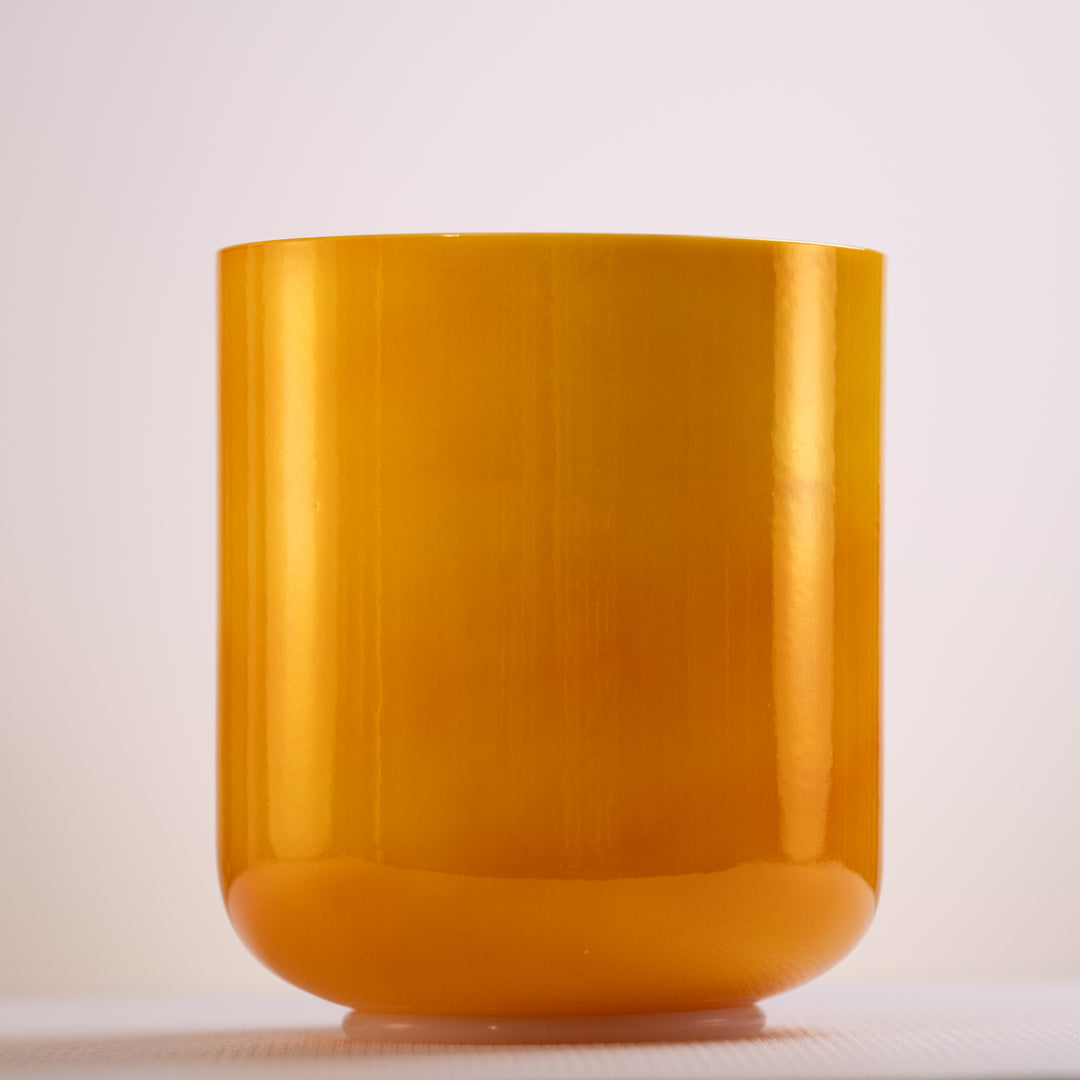 An 8.25 inch A-40 Honeycomb crystal singing bowl in pearlescent yellow, displayed against a white background.