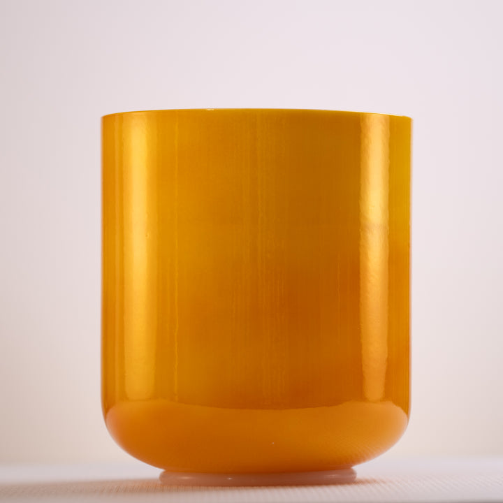 An 8.25 inch A-40 Honeycomb crystal singing bowl in pearlescent yellow, displayed against a white background.