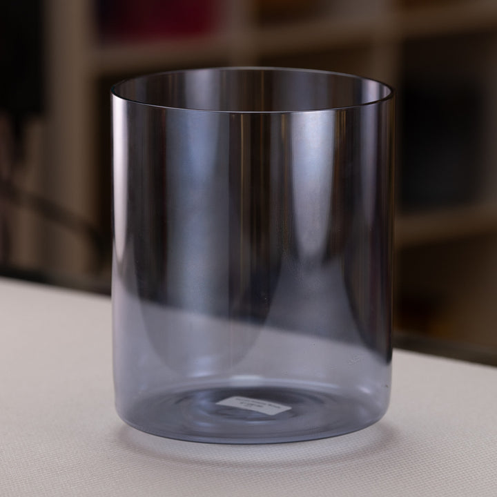 An 8-inch tall clear crystal singing bowl with a smooth surface, displayed on a white background.