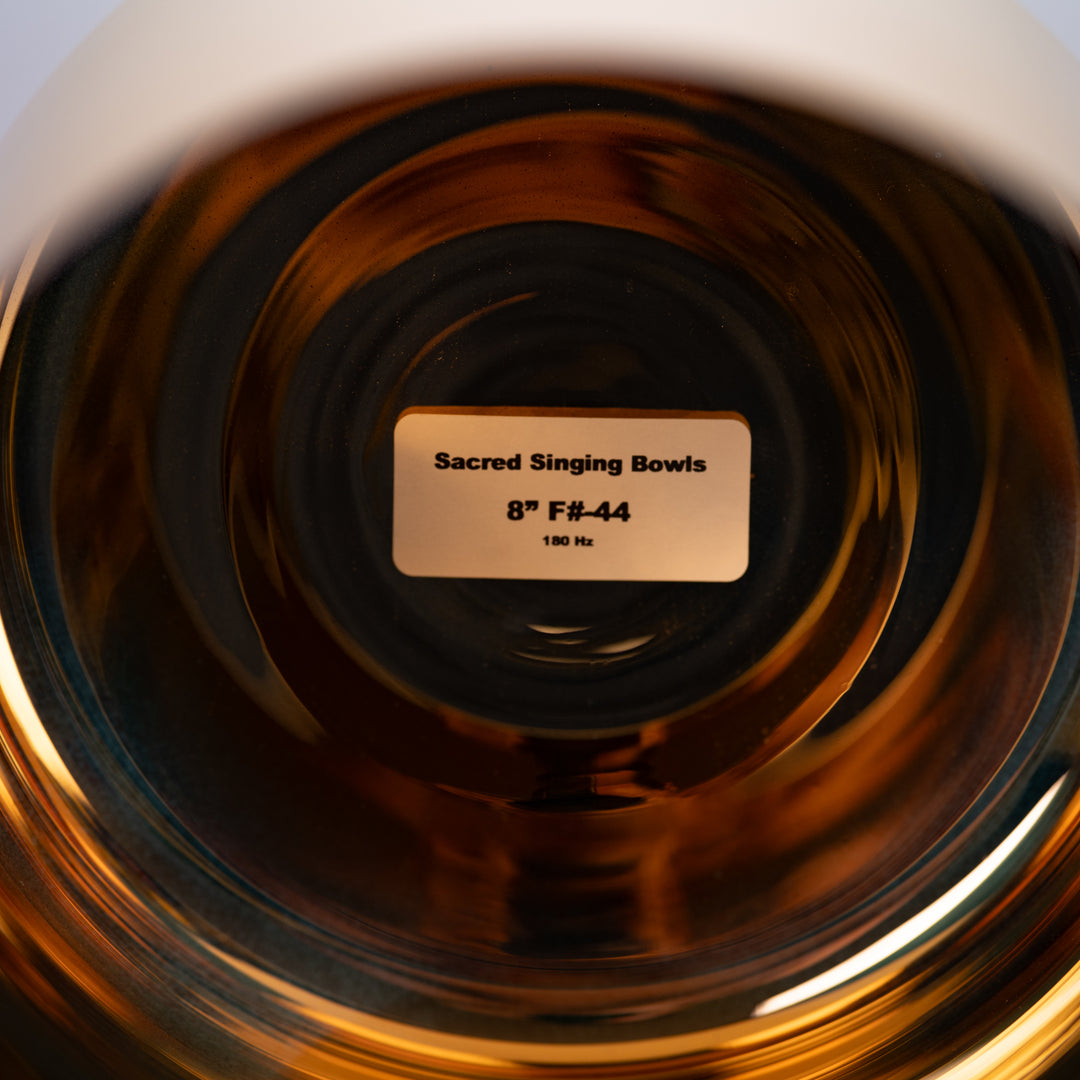 Sacred Singing Bowls™ product tag on a 24k Gold & Crystal singing bowl