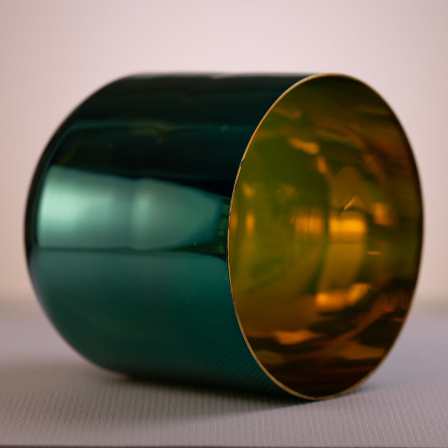 Green and gold singing bowl for sound healing