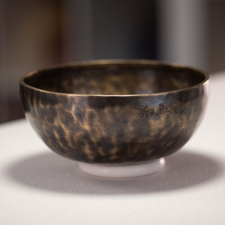 Engraved metal singing bowl