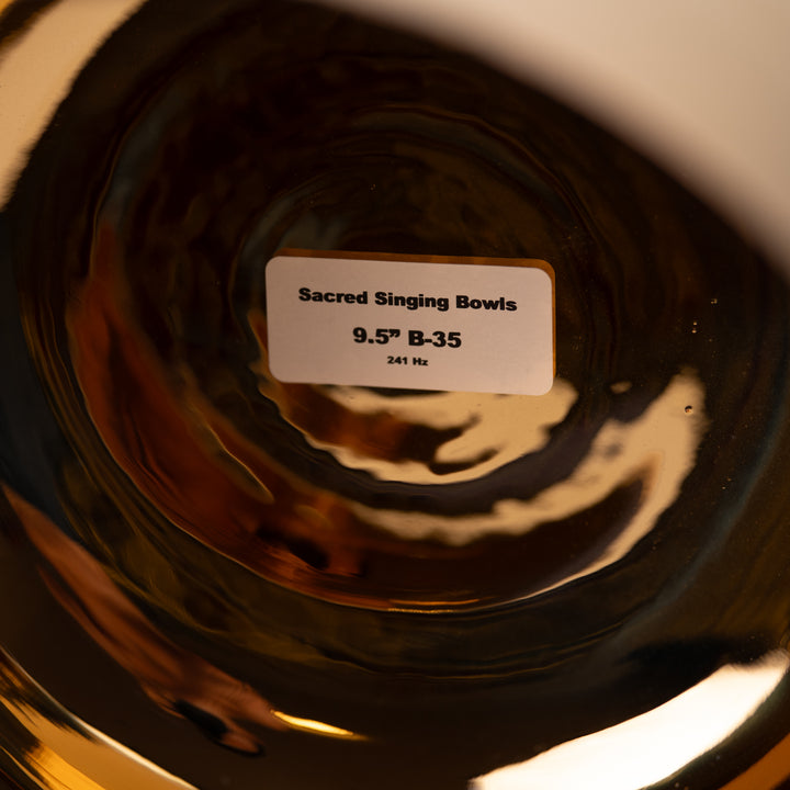 Sacred Singing Bowls™ product tag on a 24k gold & crystal bowl