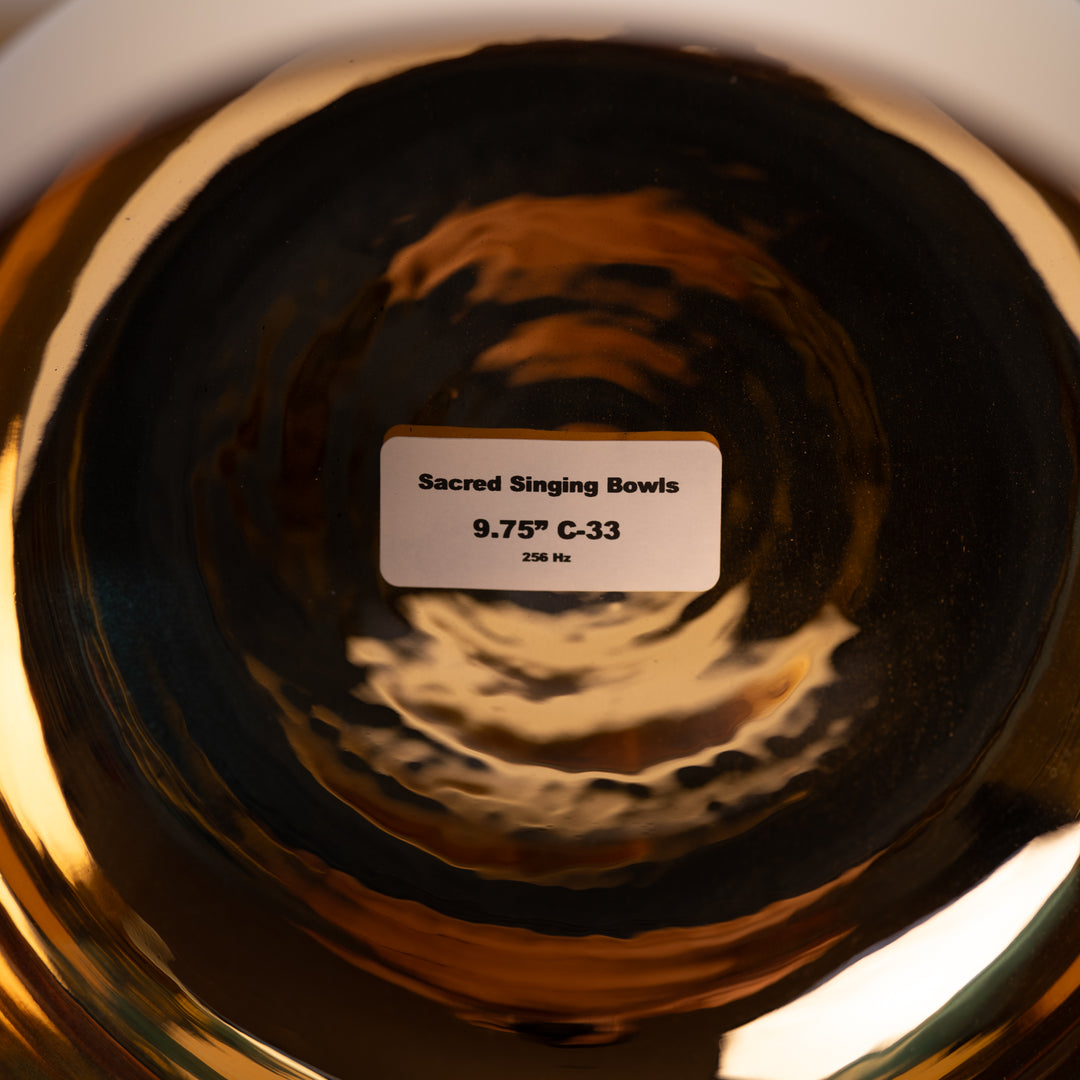 Sacred Singing Bowls™ product tag inside of a 24k Gold bowl