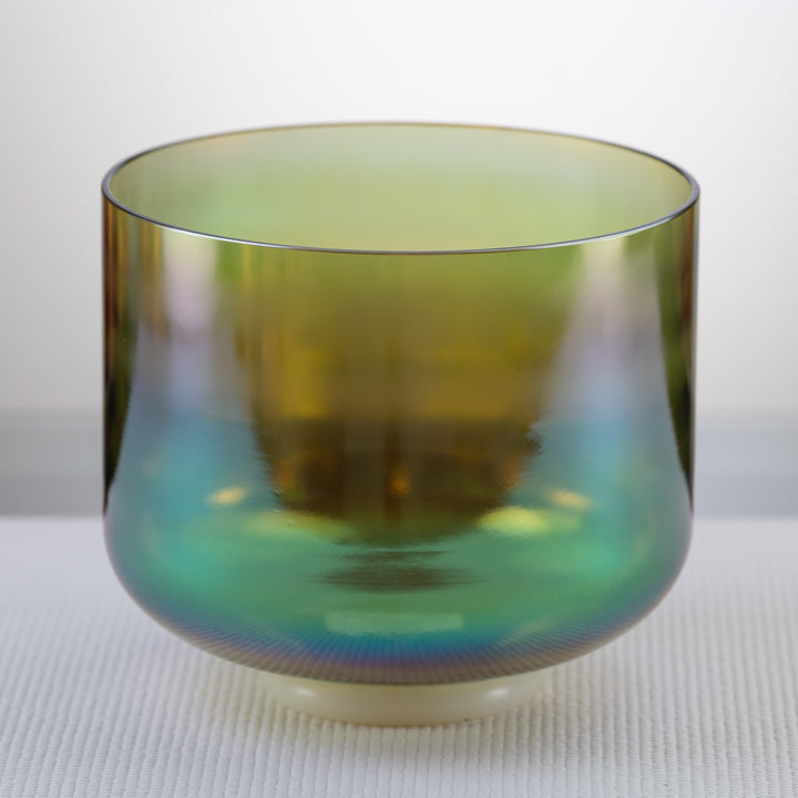 A 9 inch C#-23 Earth Magic Crystal Singing Bowl with a prismatic dark green to yellow color color.