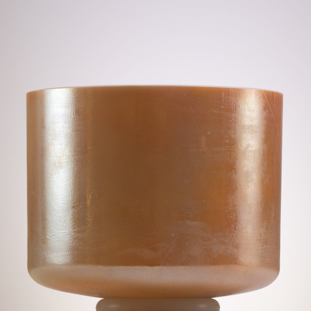 Orange singing bowl for sound healing