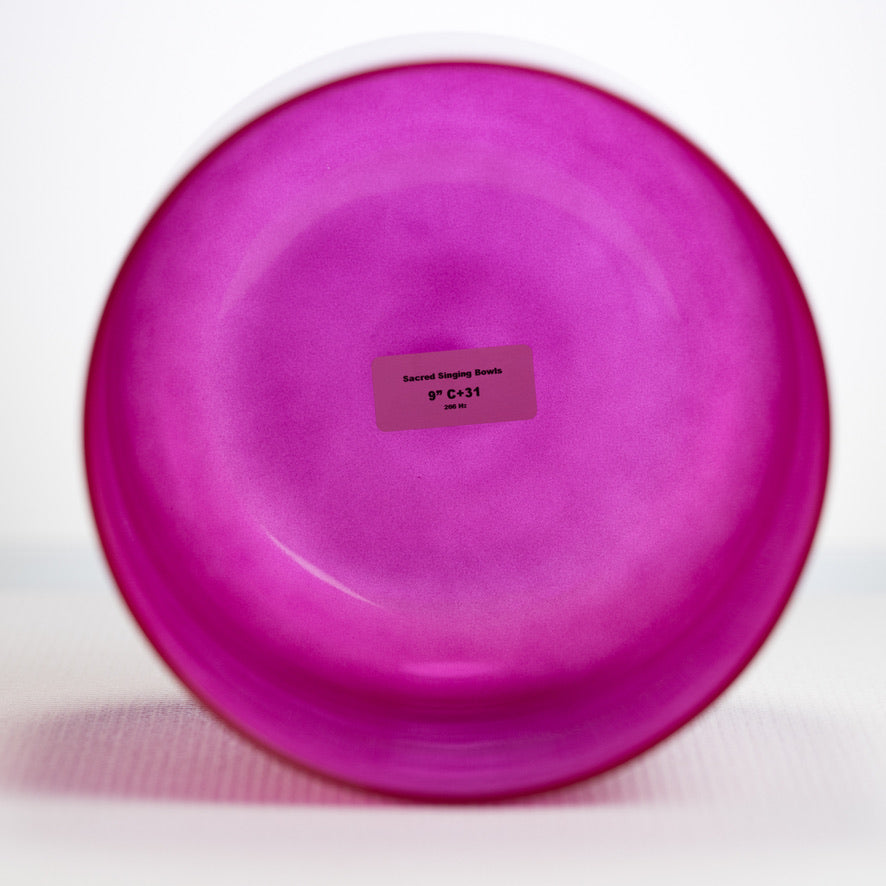 A 9-inch rose garden singing bowl with a label indicating it is 9 inches in diameter, placed on a white surface, from Sacred Singing Bowls™.