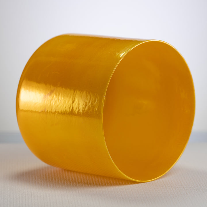 Yellow singing bowl for joyful meditation