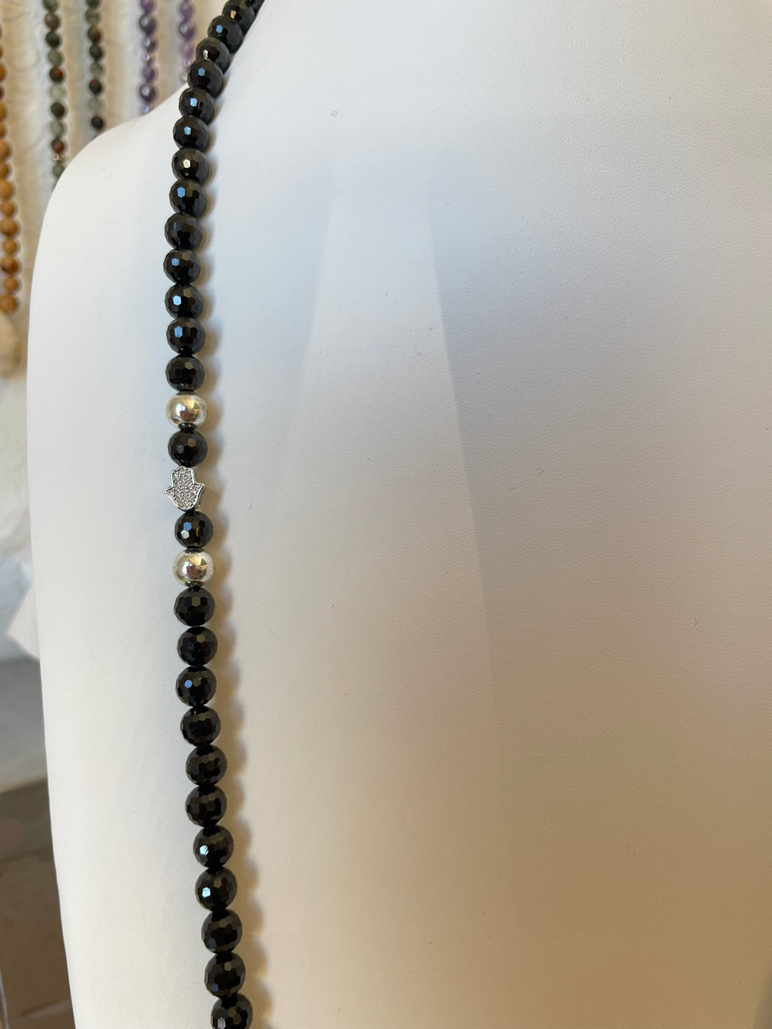 Faceted Black Spinel Mala with Hand of Hamsa pendant