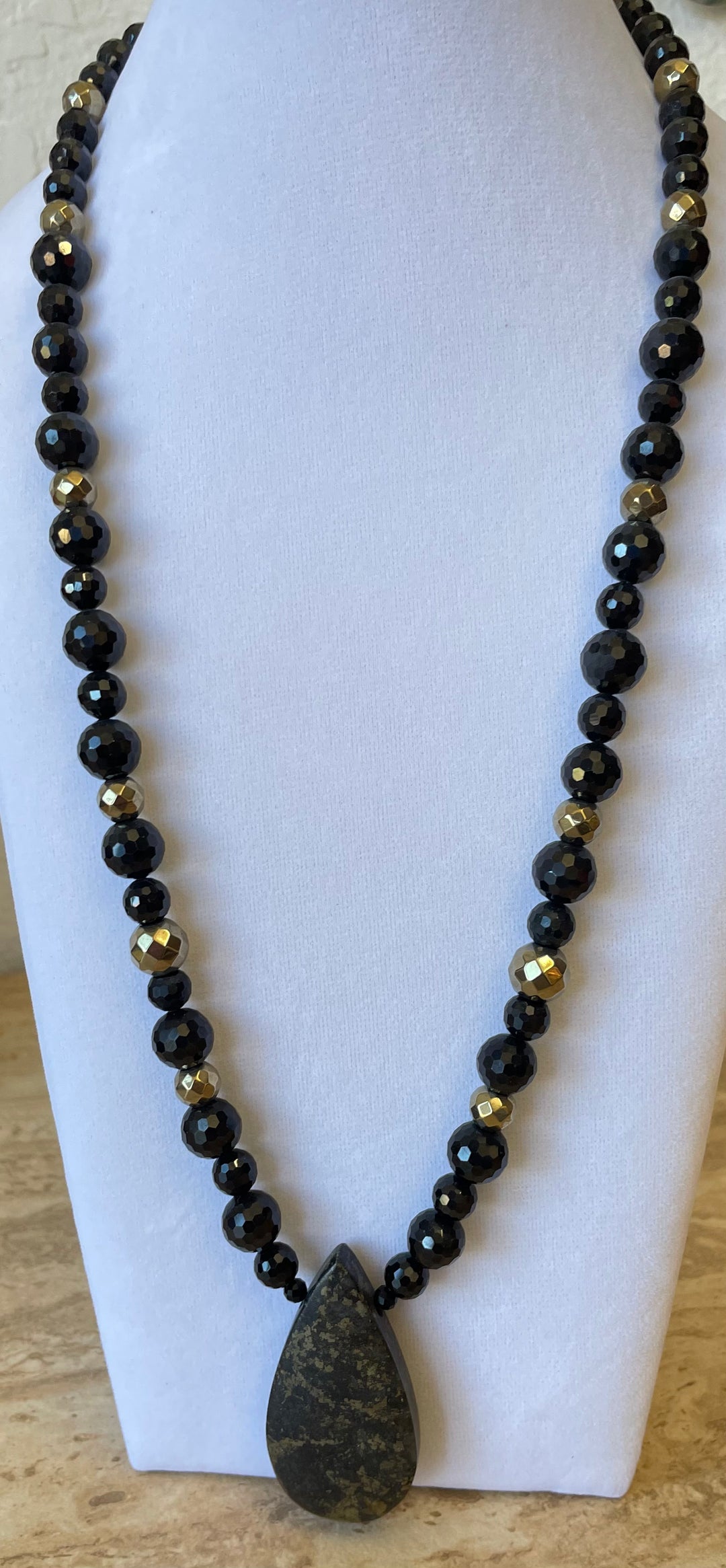 Black Spinel and Pyrite necklace made by Tara Kaur