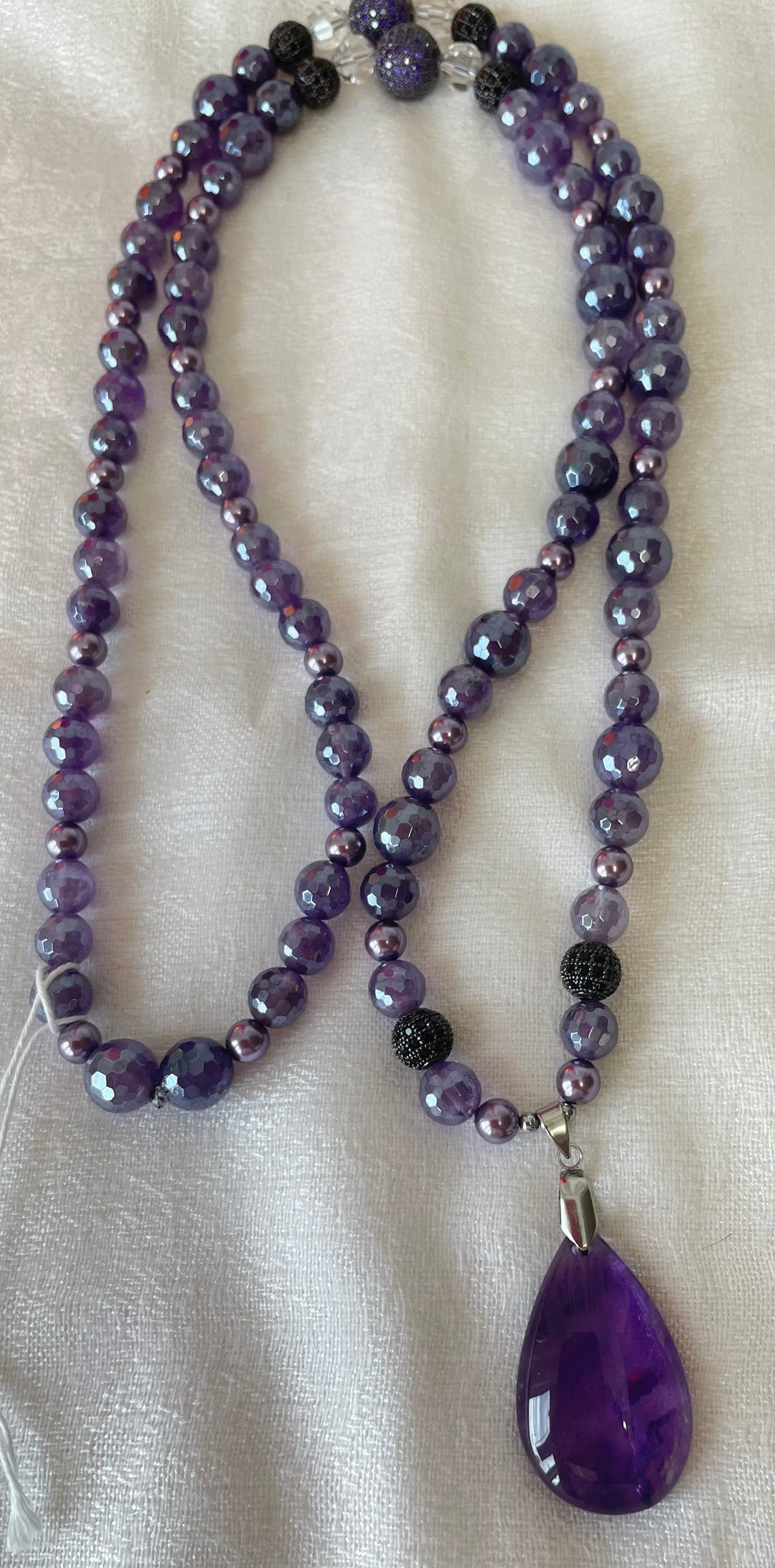 Faceted Amethyst Mala made by Tara Kaur