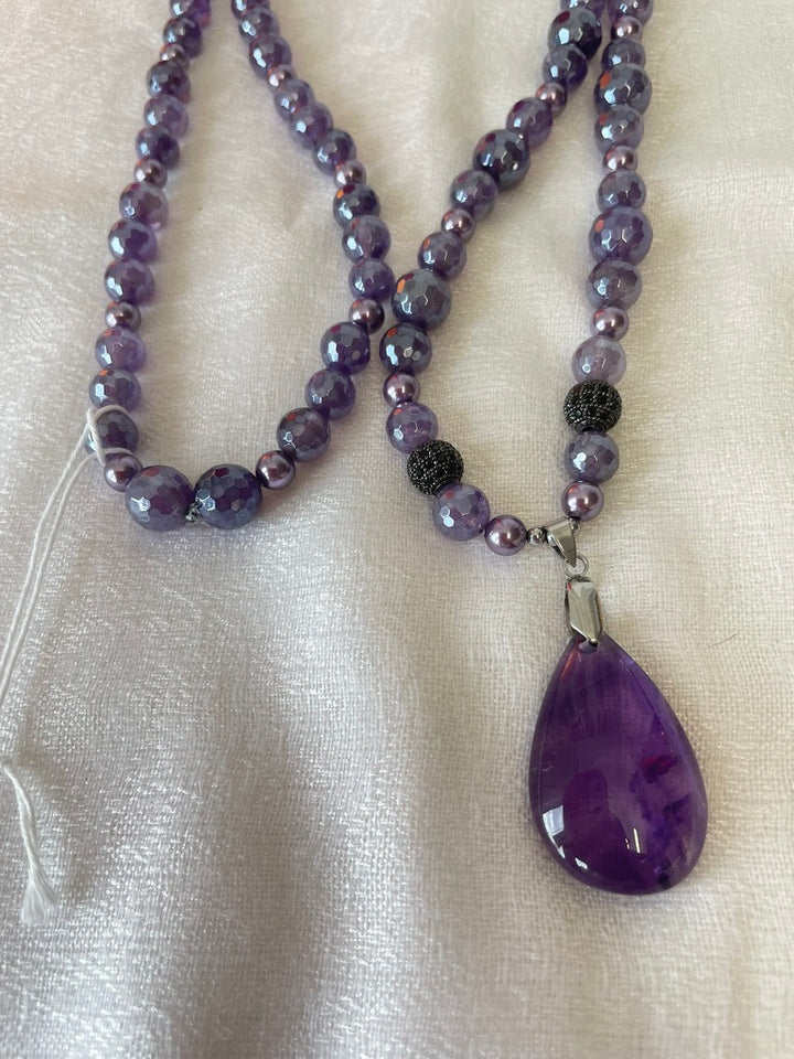 Faceted Amethyst Mala made by Tara Kaur