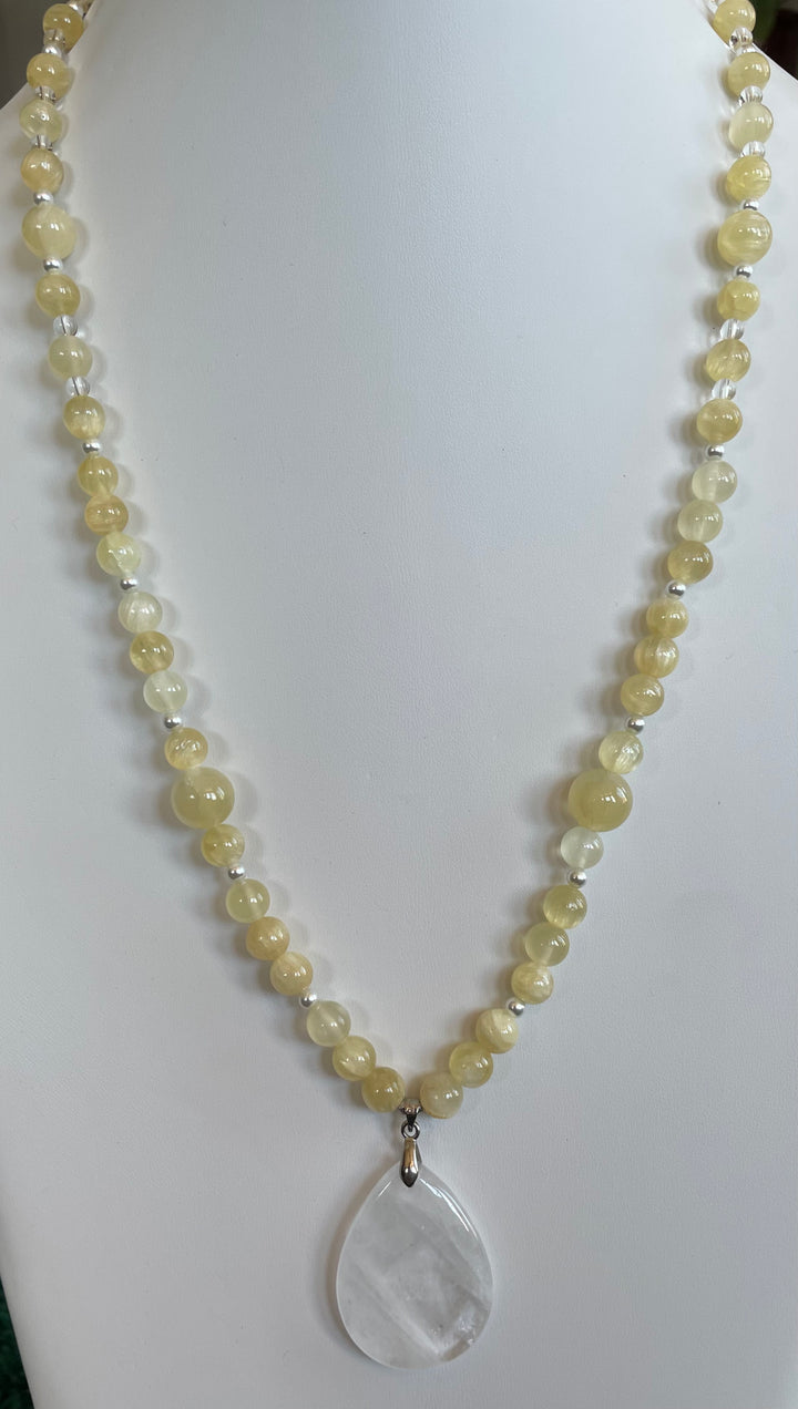 Yellow Calcite Mala with Clear Quartz pendant made by Tara Kaur