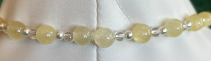 Yellow Calcite Mala with Clear Quartz pendant, made by Tara Kaur